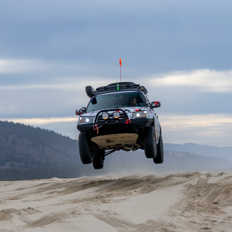 2005 Subaru Forester jumping at dunes while testing RalliTEK RallyX Long Travel Coilover Suspension Kit.