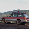2004 Subaru Outback Lifted Offroad with Mountains behind