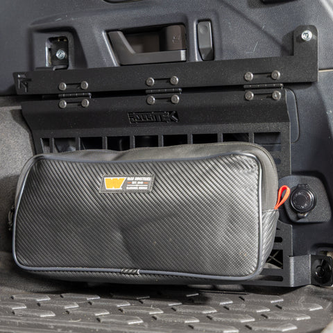 subaru outback molle panel installed in rear cargo storage area with molle bag mounted